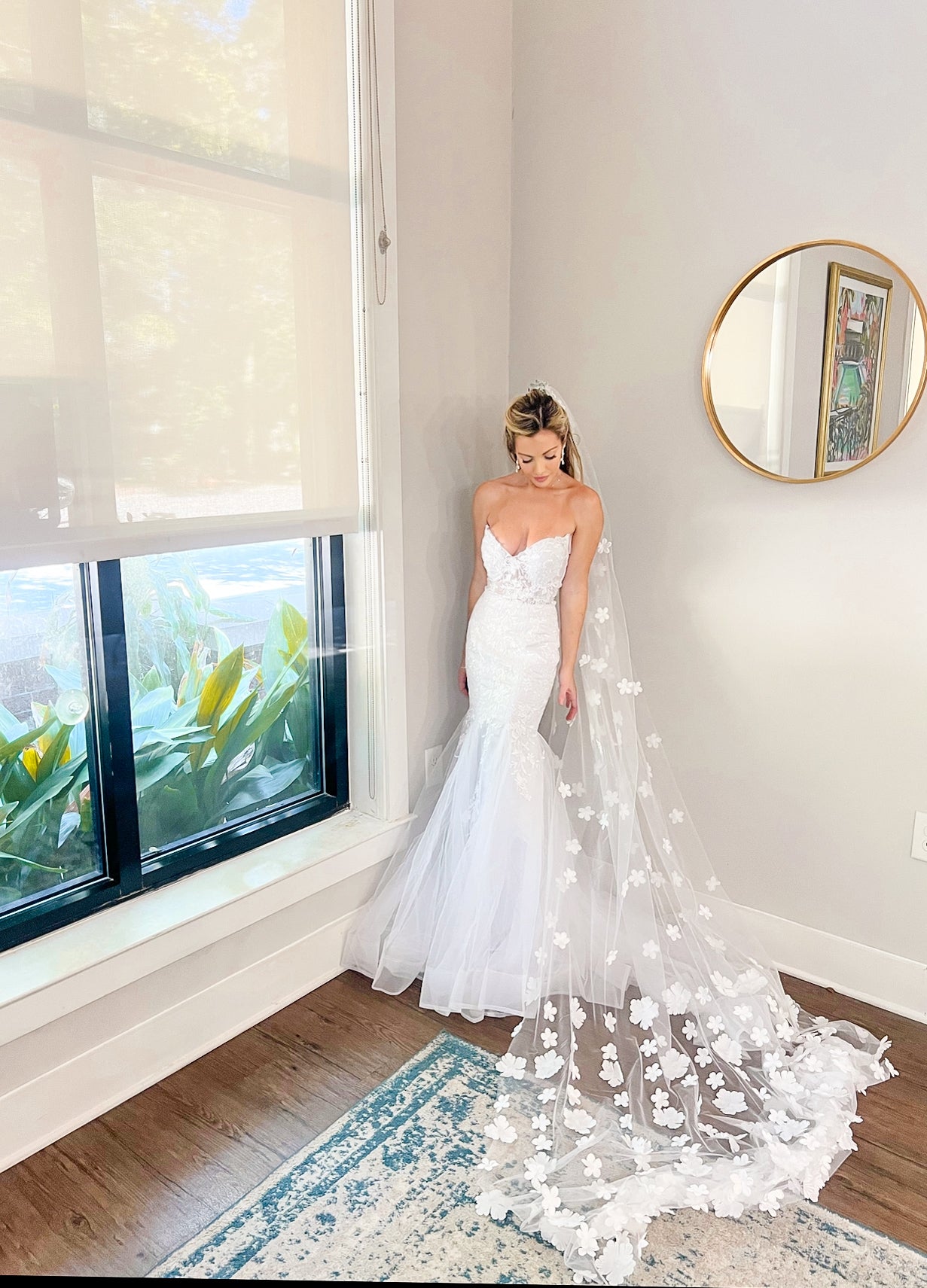 Sweetheart neckline bridal gown with hard tulle at the flare with a small tulle train. Flower Bridal Veil Luxurious. Elegant Bridal Styles