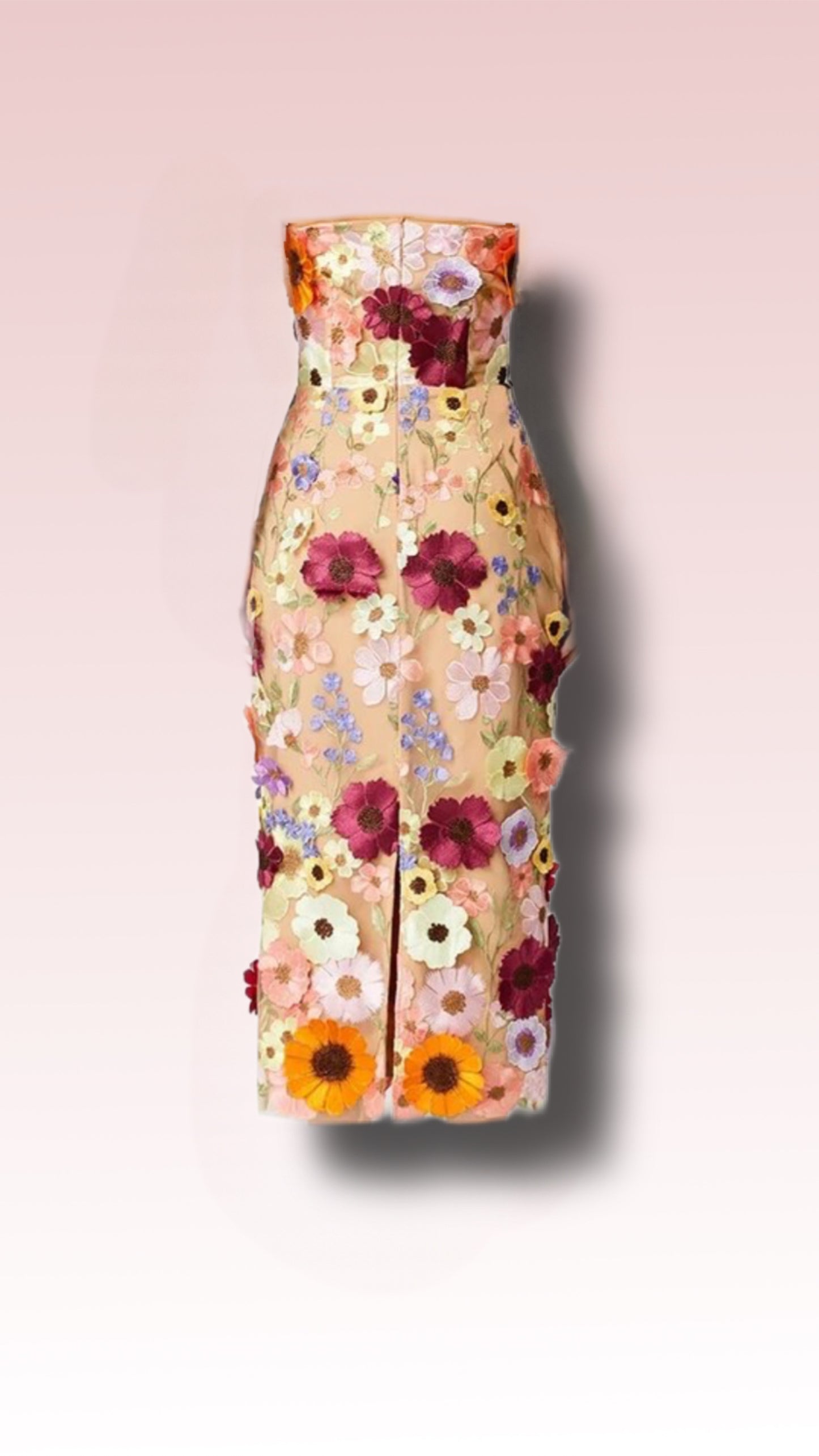 Chic and vibrant, this sleeveless floral appliqué cocktail dress is perfect for wedding attendees and special occasions. Features a sheer fabric adorned with multi-colored flowers.