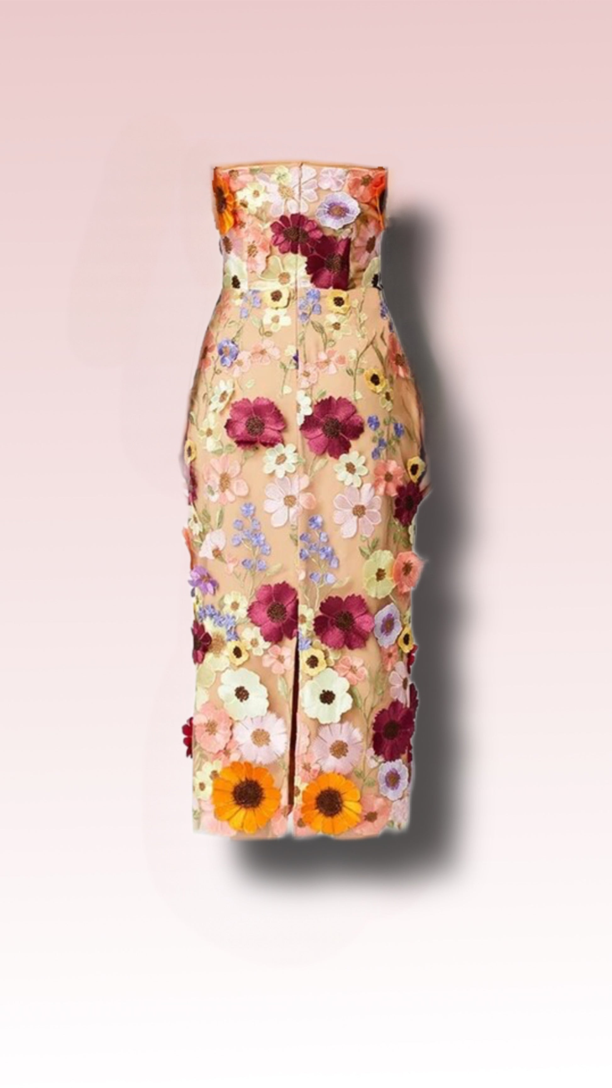 Chic and vibrant, this sleeveless floral appliqué cocktail dress is perfect for wedding attendees and special occasions. Features a sheer fabric adorned with multi-colored flowers.