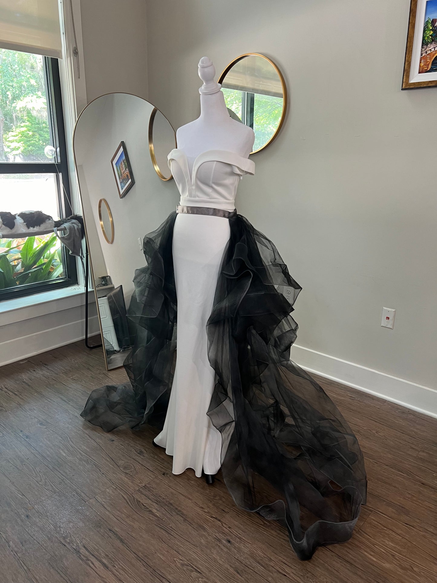 Stunning black wedding dress with a long, flowing train adorned with delicate lace details, perfect for an elegant and dramatic bridal entrance at a gothic-themed wedding. Gothic wedding skirt, black tulle bridal skirt,