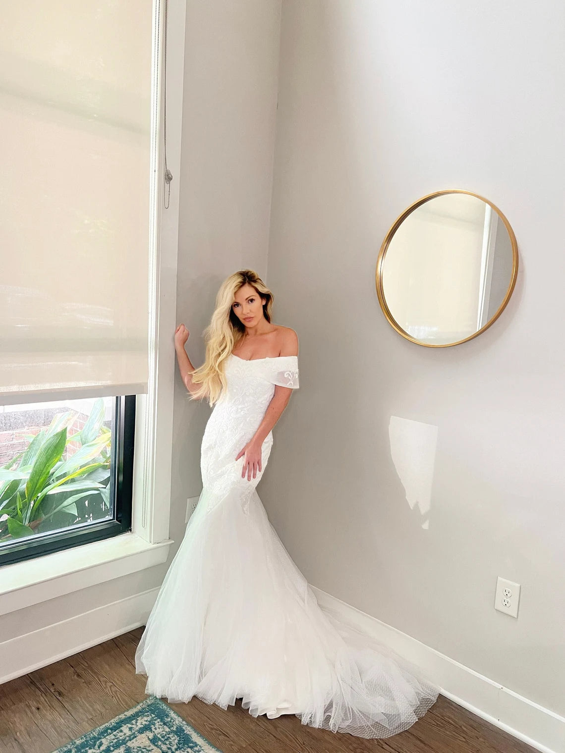 Haus of lace mermaid wedding dress with small tulle train