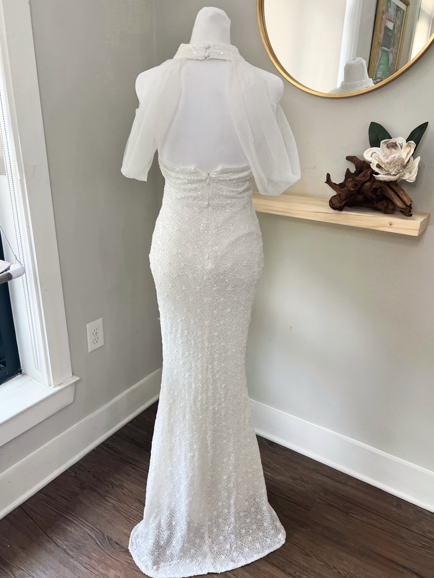Old Hollywood wedding dress on mannequin back view
