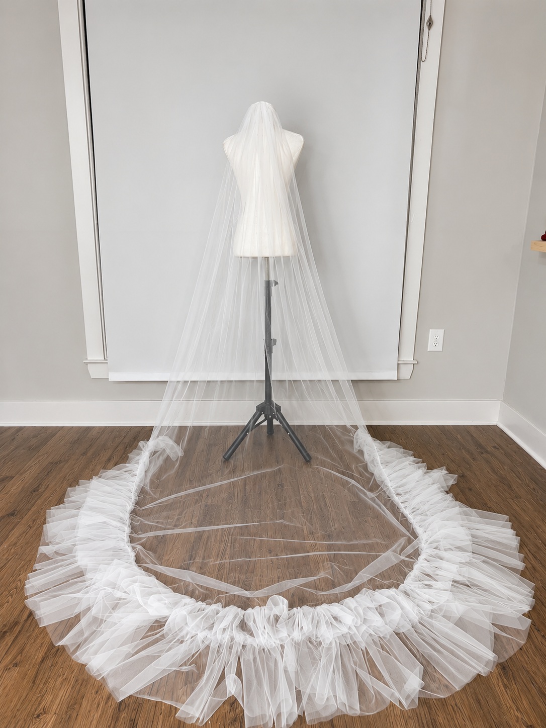 Wedding Veil half ruffle on hardwood floor